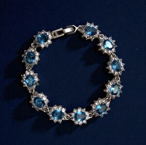Beguiling Light Blue & Clear Floral Cluster Tennis Bracelet